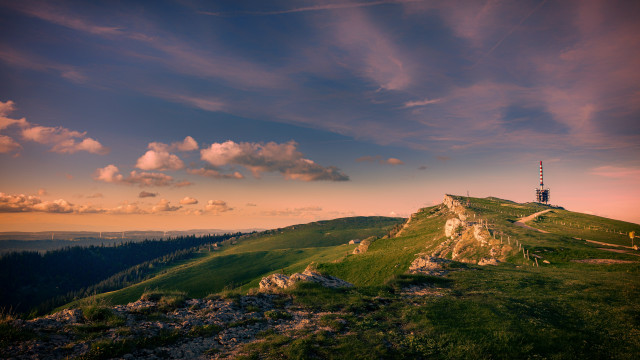 Hill tower clouds cityscape sunset free wallpaper for desktop - medium preview image