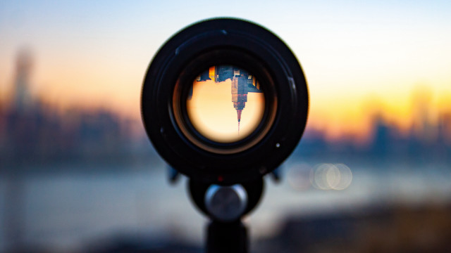 Camera lens city sunset reflection free wallpaper for desktop - medium preview image