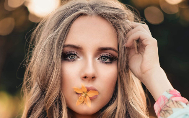 Woman flower nose mouth portrait free wallpaper for desktop - medium preview image