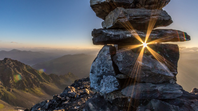 Rock sunshine mountains lens flare free wallpaper for desktop - medium preview image