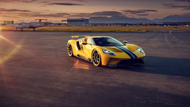 Yellow sports car runway sunset #2 free wallpaper for desktop - medium preview image