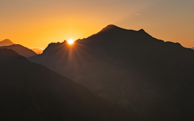 Sunset mountains bird cloudy sky free wallpaper for desktop - medium preview image