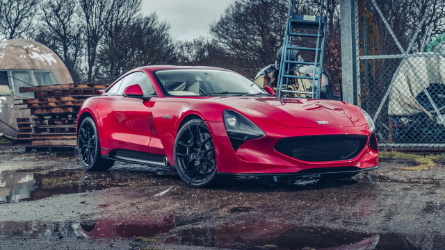 Red sports car fence truck free wallpaper for desktop - medium preview image