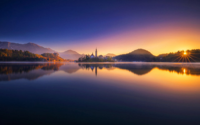 Lake church mountains sunset impressionist free wallpaper for desktop - medium preview image