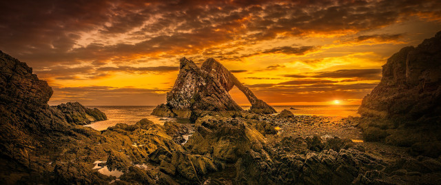 Beach sunset rock formation ocean free wallpaper for desktop - medium preview image