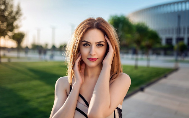 Woman posing park hands face free wallpaper for desktop - medium preview image