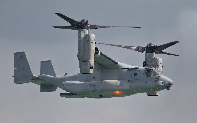 Military helicopter flying propellers precisionism free wallpaper for desktop - medium preview image