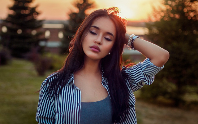 Woman long hair field blurry free wallpaper for desktop - medium preview image