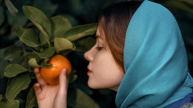 Woman blue scarf orange smile free wallpaper for desktop - medium preview image