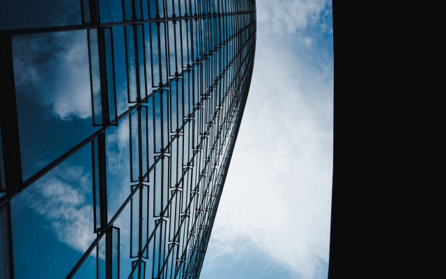 Tall building sky clouds plane free wallpaper for desktop - medium preview image