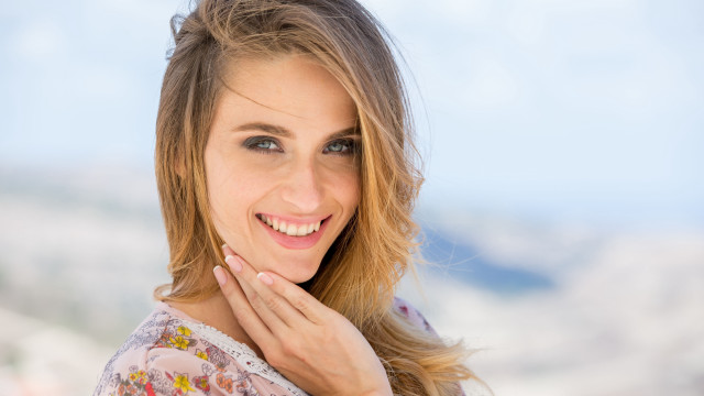 Eszter mattioni smiling mountain background free wallpaper for desktop - medium preview image