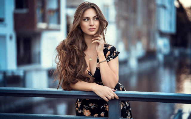 Woman leaning portrait bokeh jewelry free wallpaper for desktop - medium preview image