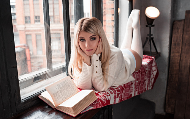 Woman reading window sill posing free wallpaper for desktop - medium preview image