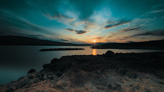 Sunset lake mountain reflection boat free wallpaper for desktop - medium preview image