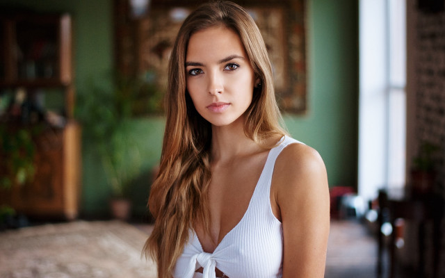 Woman white top green walls free wallpaper for desktop - medium preview image