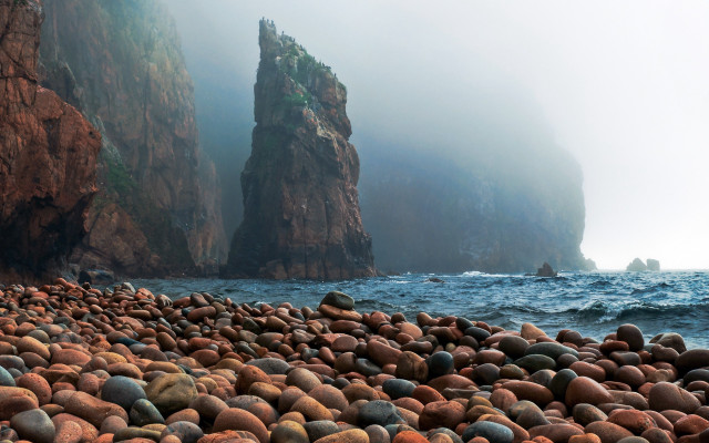 Rocky beach land art puzzle free wallpaper for desktop - medium preview image