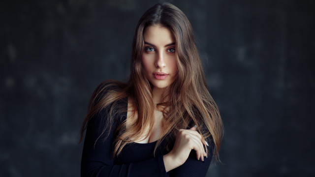 Serious blonde woman portrait blueeyes free wallpaper for desktop - medium preview image