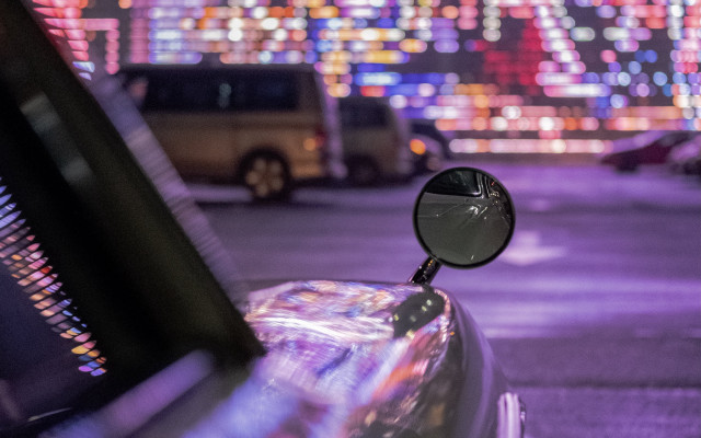 Car mirror city night blurry free wallpaper for desktop - medium preview image