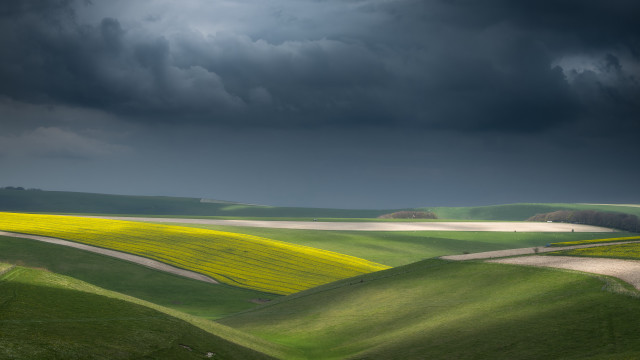 Green field road stormy sky free wallpaper for desktop - medium preview image