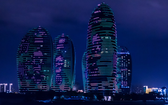 Futuristic cityscape night skyline reflection free wallpaper for desktop - medium preview image