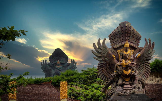 Demon statue wings sunset skyline free wallpaper for desktop - medium preview image