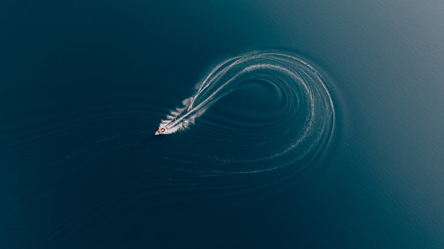 Boat smoke water long distance free wallpaper for desktop - medium preview image