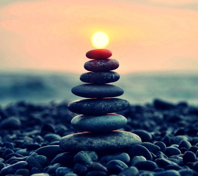 Stacked rocks beach ocean candle free wallpaper for tablet - medium preview image