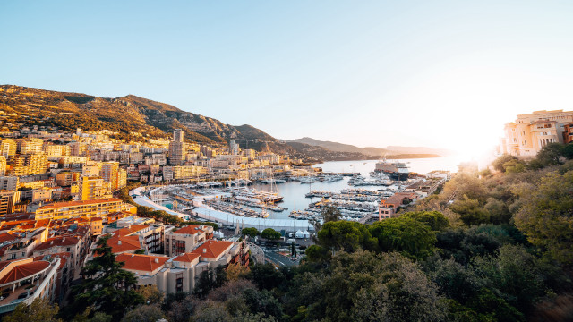 Harbor boat mountain sunset cityscape free wallpaper for desktop - medium preview image