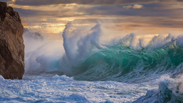 Large wave cliff sunset person free wallpaper for desktop - medium preview image