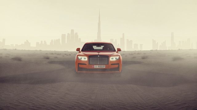 Red car desert city fog free wallpaper for desktop - medium preview image