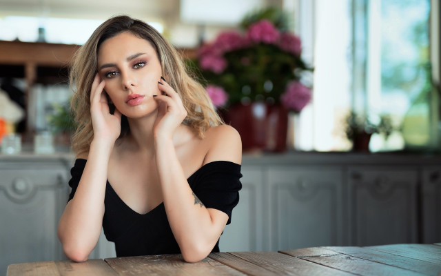 Serious woman table face black free wallpaper for desktop - medium preview image