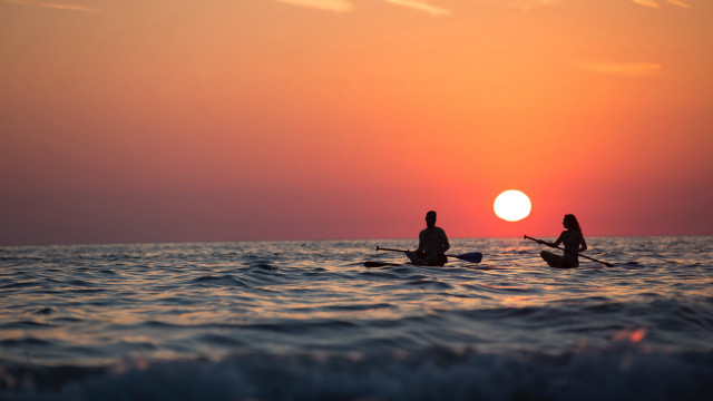 Surfing dawn sunset ocean silhouette free wallpaper for desktop - medium preview image
