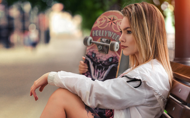 Woman sitting bench skateboard blonde free wallpaper for desktop - medium preview image