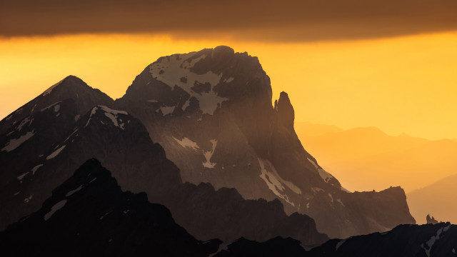 Mountain peak yellow sky clouds free wallpaper for desktop - medium preview image