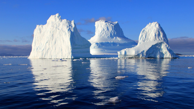 Iceberg ocean birds sky mountains free wallpaper for desktop - medium preview image