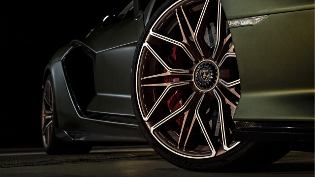 Car wheel closeup dark room free wallpaper for desktop - medium preview image