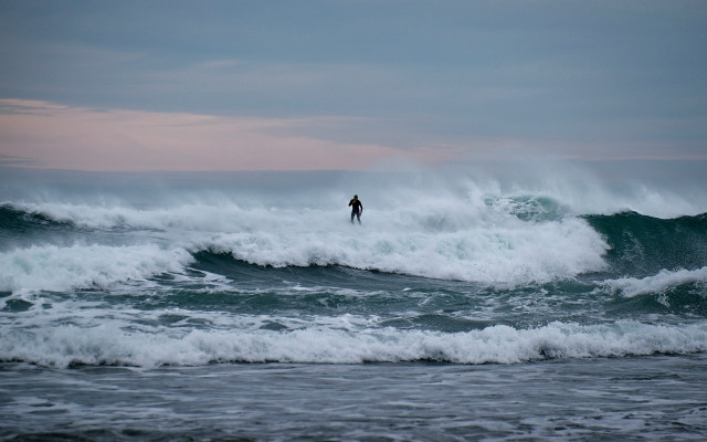 Surfboard figure ocean sunset cloudy free wallpaper for desktop - medium preview image