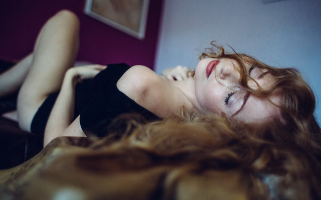 Woman lying blurry flowing hair free wallpaper for desktop - medium preview image