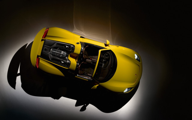 Yellow sports car above dark free wallpaper for desktop - medium preview image