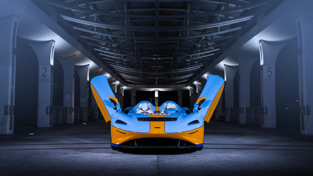 Futuristic car large building long free wallpaper for desktop - medium preview image