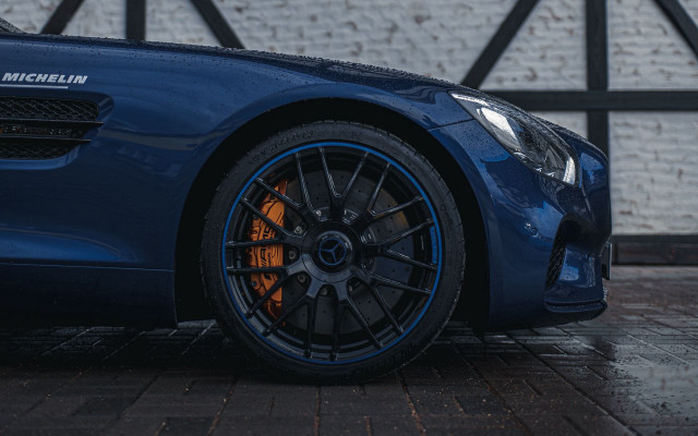 Blue sports car brick wall #3 free wallpaper for desktop - medium preview image