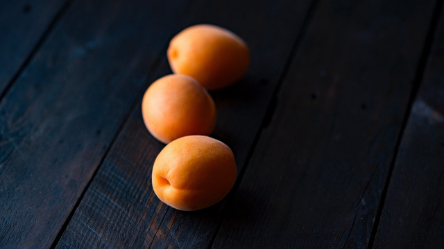 Three oranges wooden table minimalism free wallpaper for desktop - medium preview image