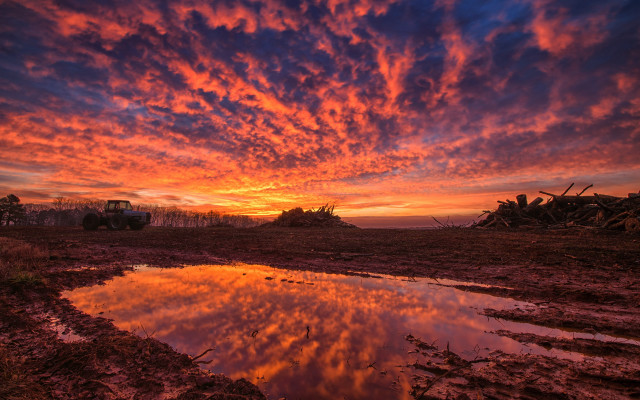 Sunset tractor puddle autumn leaves free wallpaper for desktop - medium preview image
