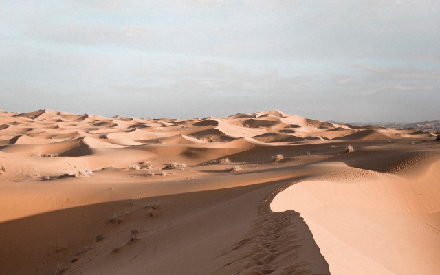 Desert sand dunes clouds footprints free wallpaper for desktop - medium preview image