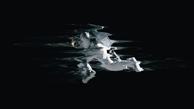 White statue floating water night free wallpaper for desktop - medium preview image