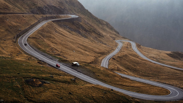 Winding road mountainside cars mountain free wallpaper for desktop - medium preview image