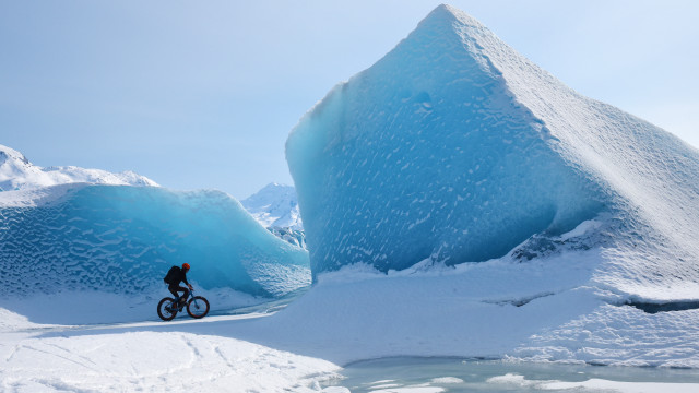 Iceberg biker snowy landscape blue free wallpaper for desktop - medium preview image