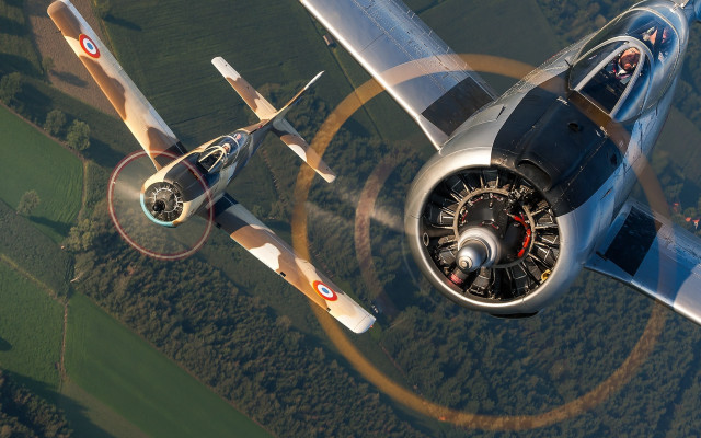 Small airplane flying propellers precisionism free wallpaper for desktop - medium preview image