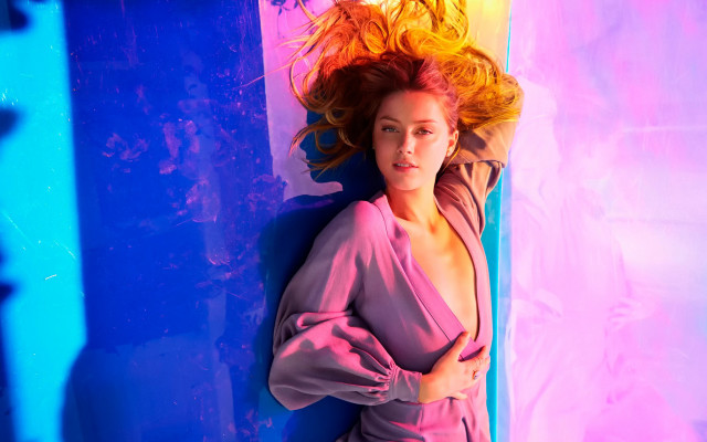 Woman red hair laying on free wallpaper for desktop - medium preview image