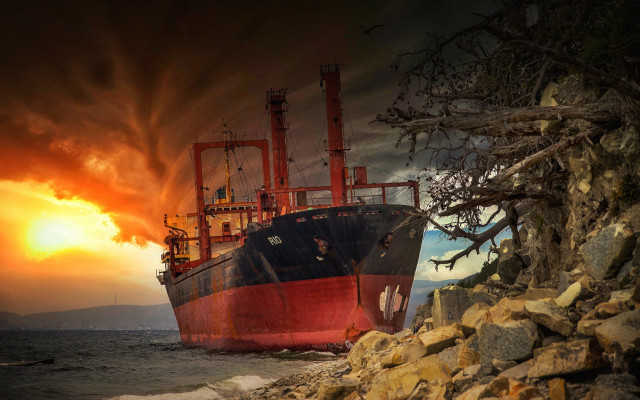 Large boat rocky shore sunset free wallpaper for desktop - medium preview image